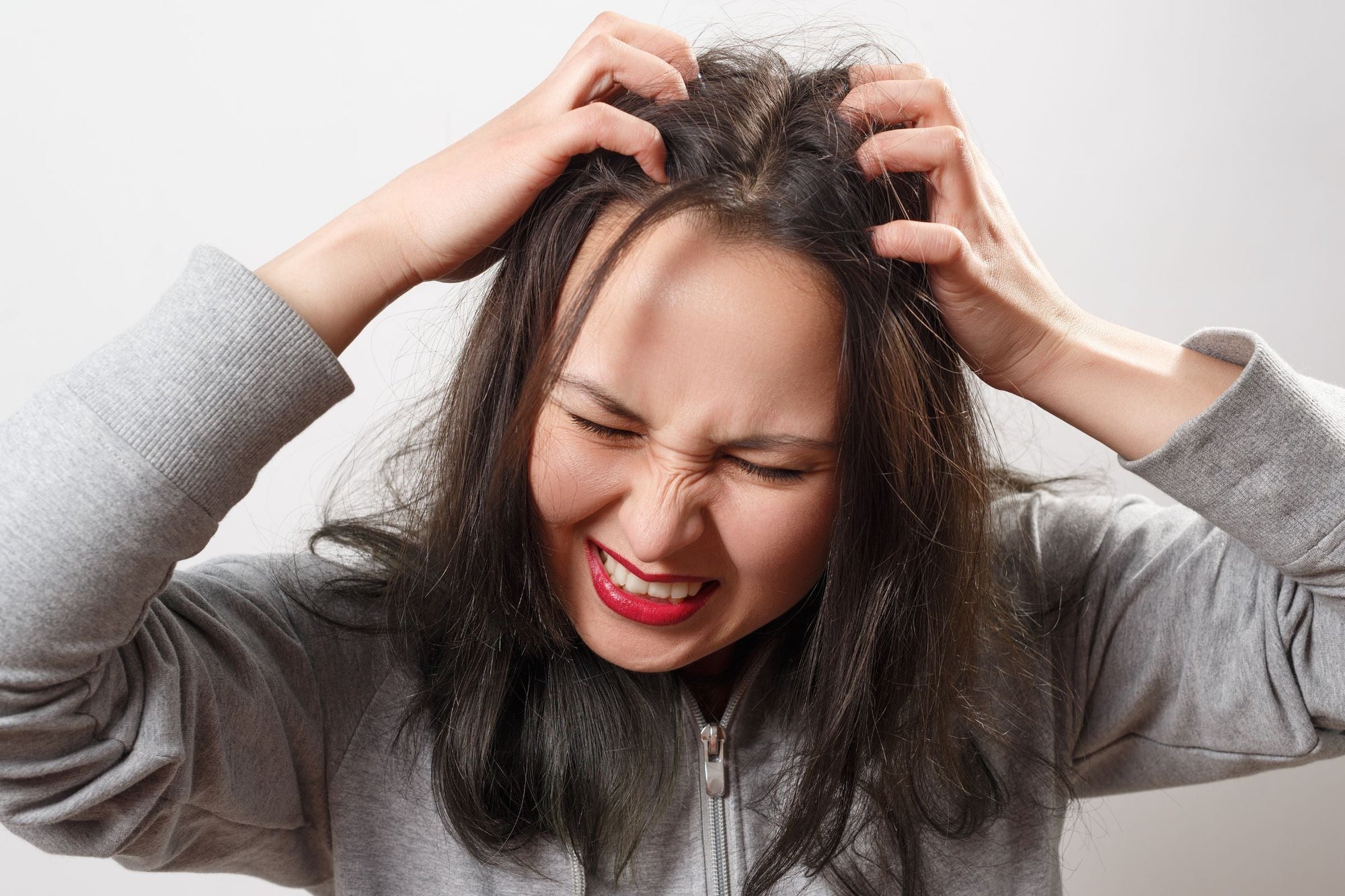 Woman with sensitive scalp