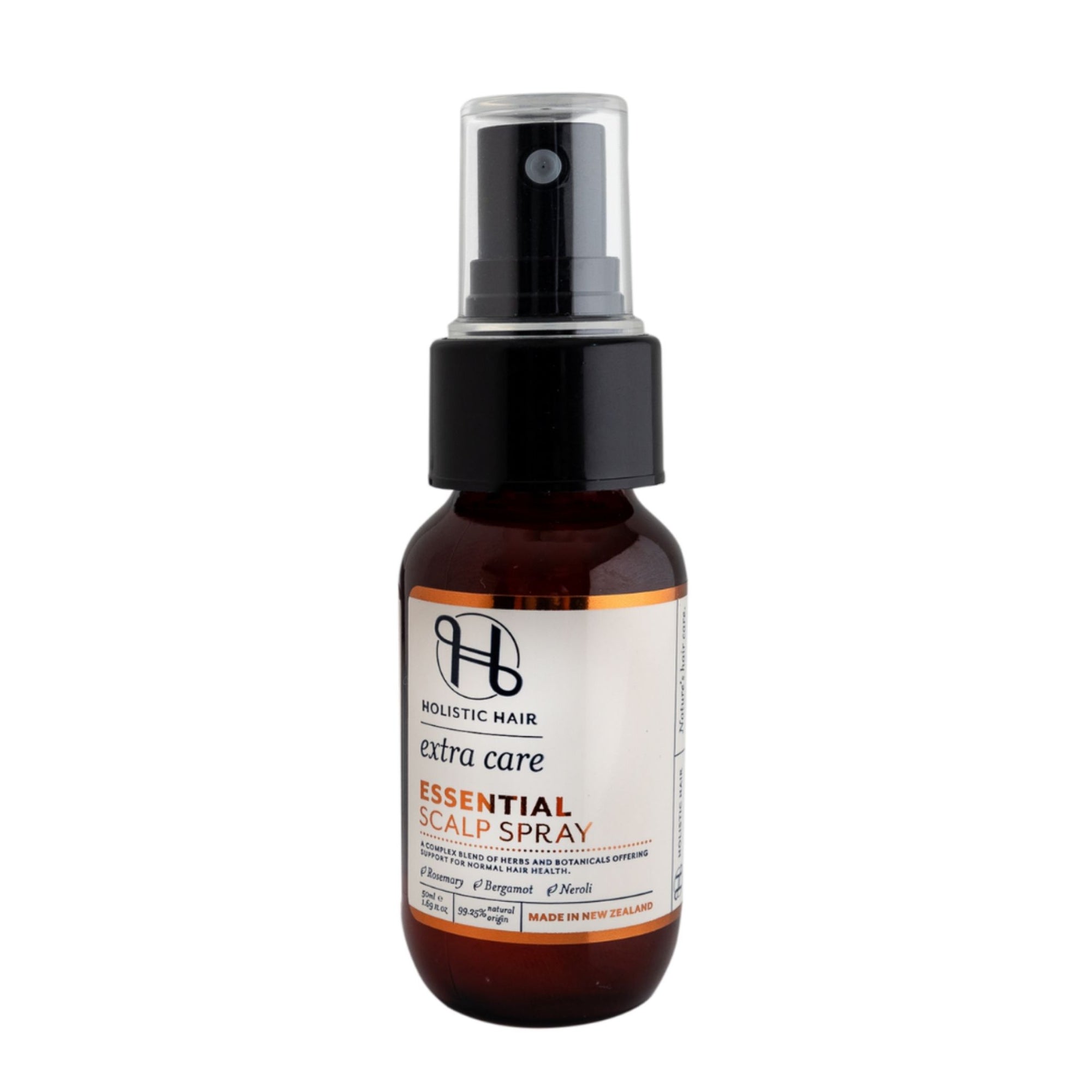 Natural scalp spray with essential oils and herbs, designed to support circulation, reduce hair fall, and refresh the scalp.