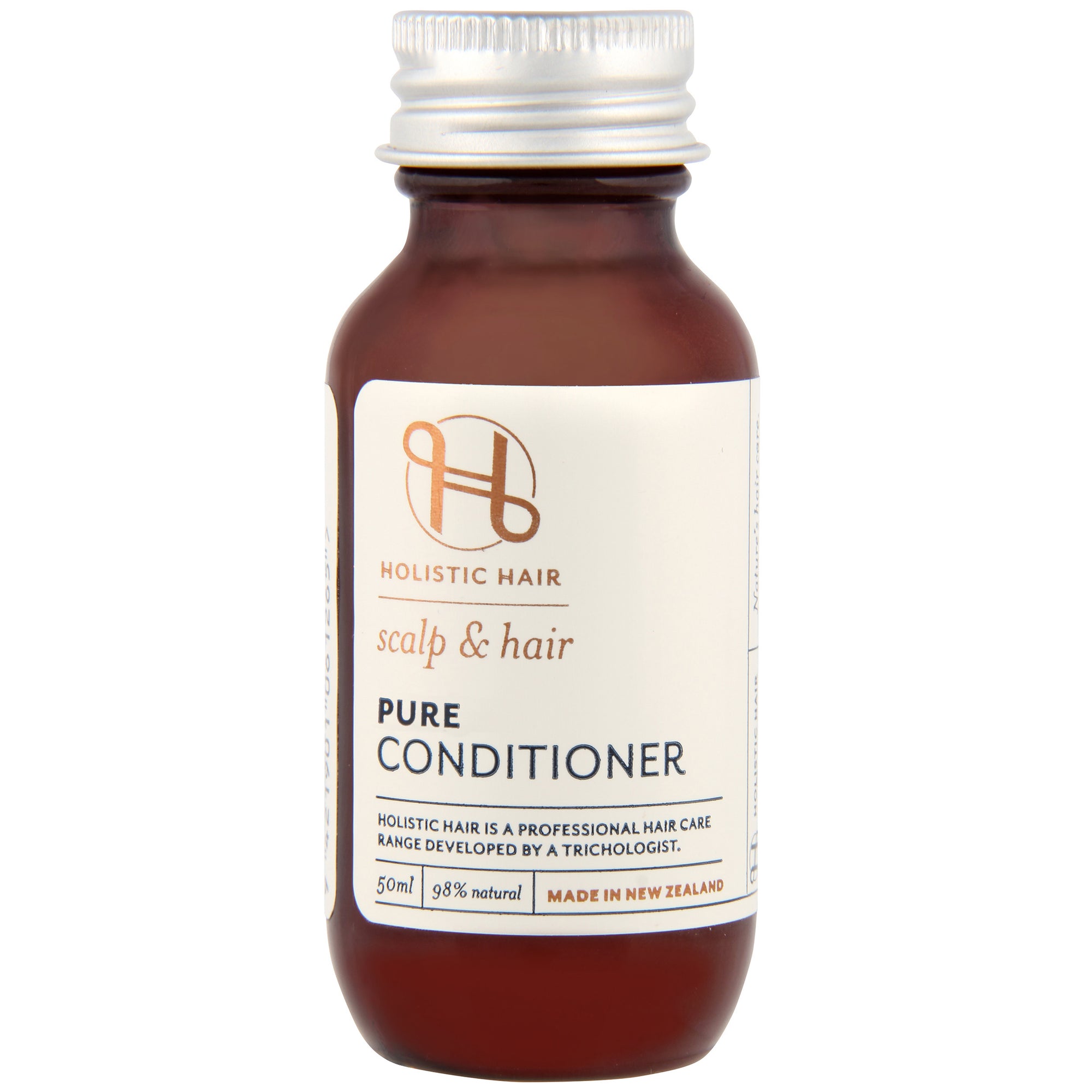 Pure Conditioner bottle with nourishing formula featuring manuka honey, aloe vera, and orange oil.