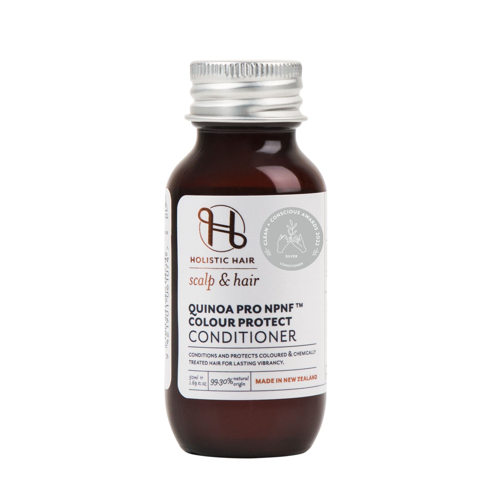 Bottle of Quinoa Pro NPNF™ Colour Protect Conditioner surrounded by natural ingredients like Murumuru butter, flax, and mango.